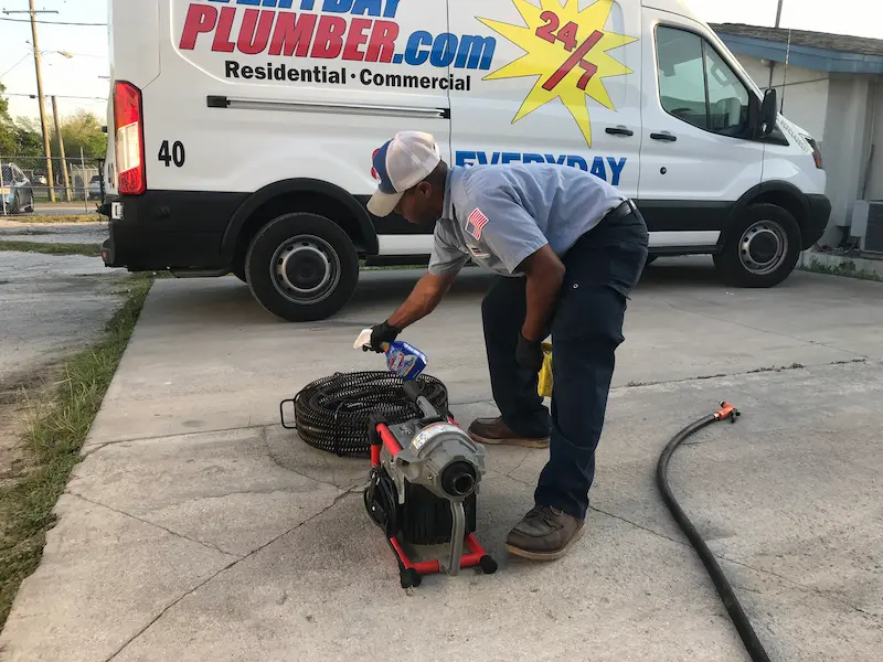 clean-plumber-equipment-care-everydayplumber EVERYDAYPLUMBER.com plumber cleaning and caring for drain cleaning equipment to ensure professional service